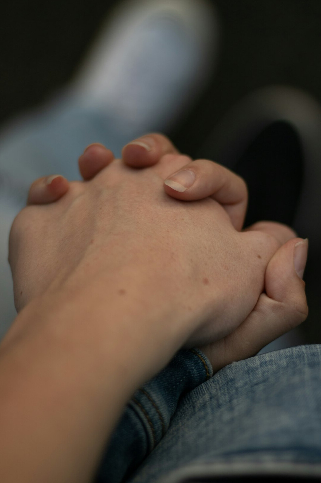 Two professionals shaking hands in an office