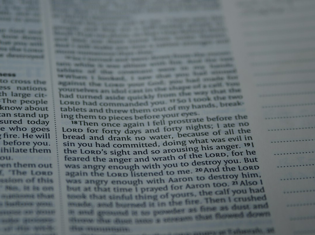 Close-up of a newspaper page with text
