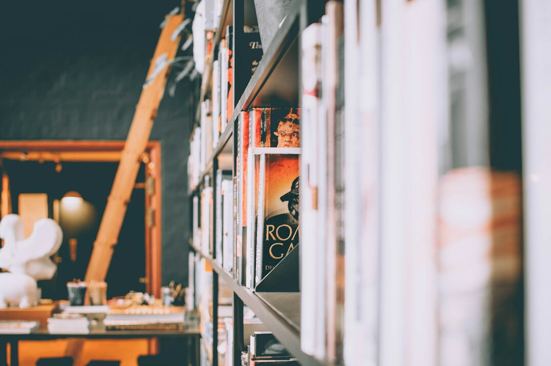 Rows of archived binders and folders on a shelf